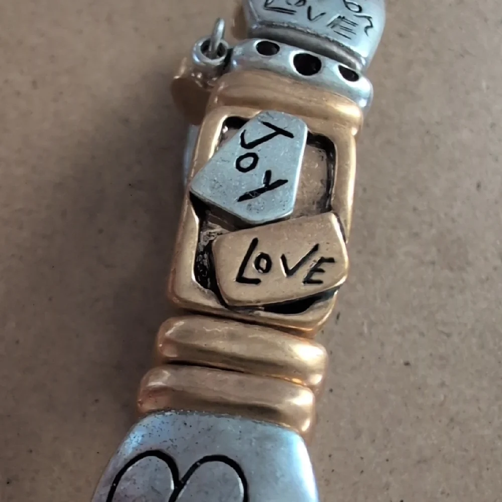 Silver and Gold Tone Heart with Red Crystals Stretch Bracelet